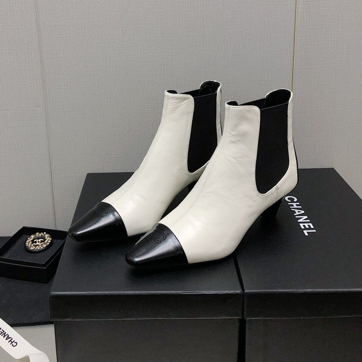 Chanel Short Boots in White Mix Black Sheepskin