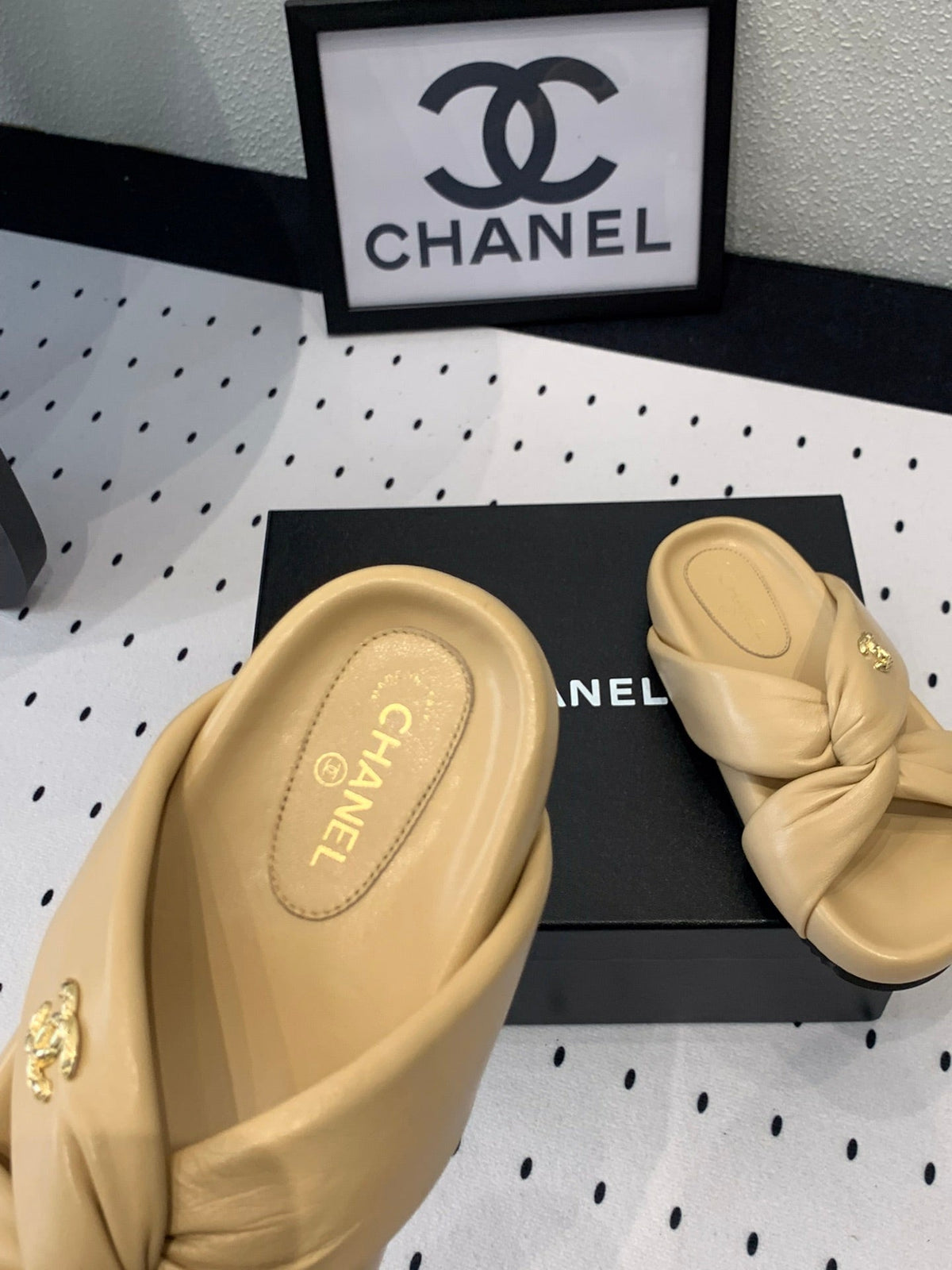 Chanel Twisted Slippers in Dark Cream Lambskin