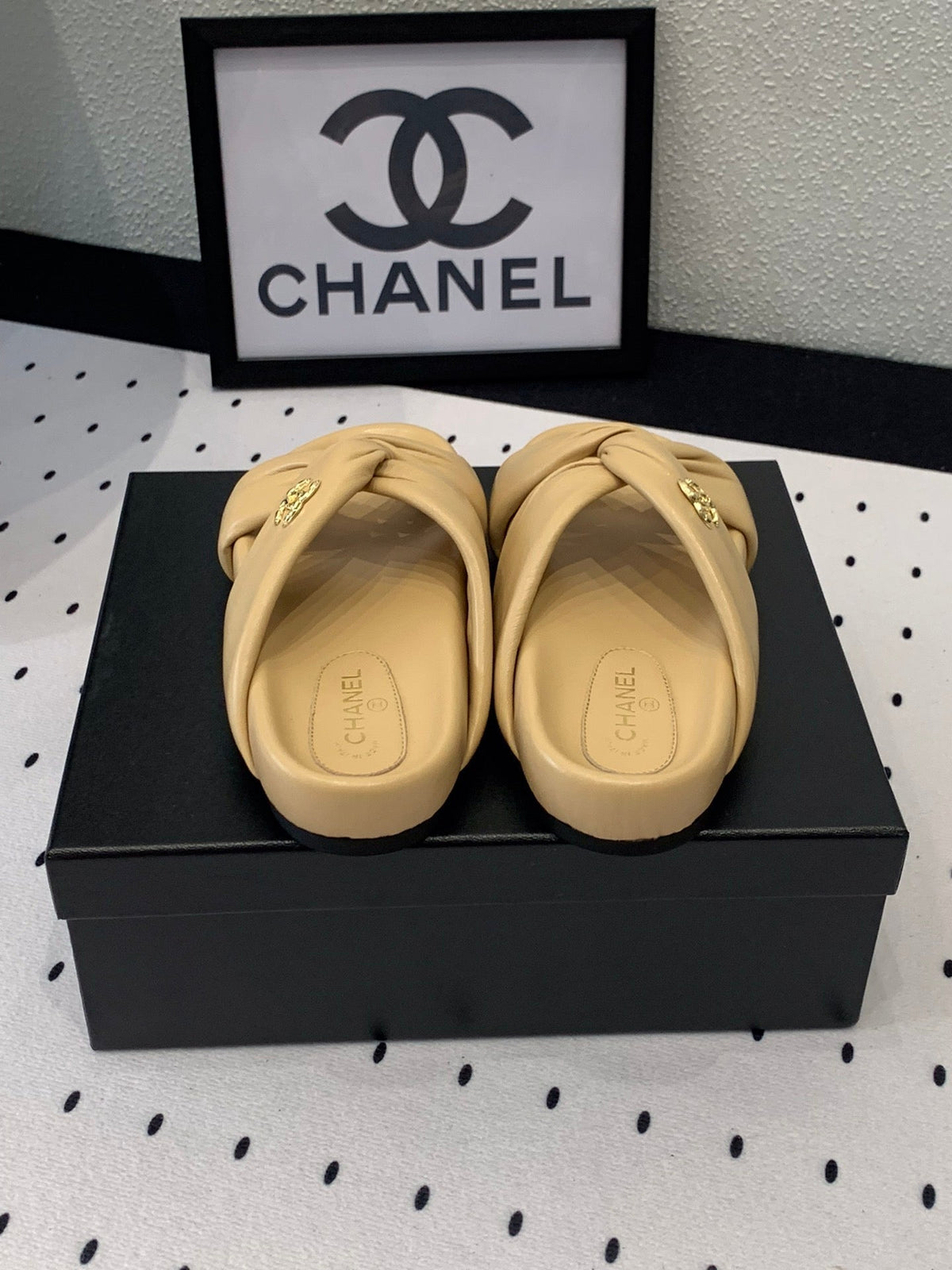 Chanel Twisted Slippers in Dark Cream Lambskin