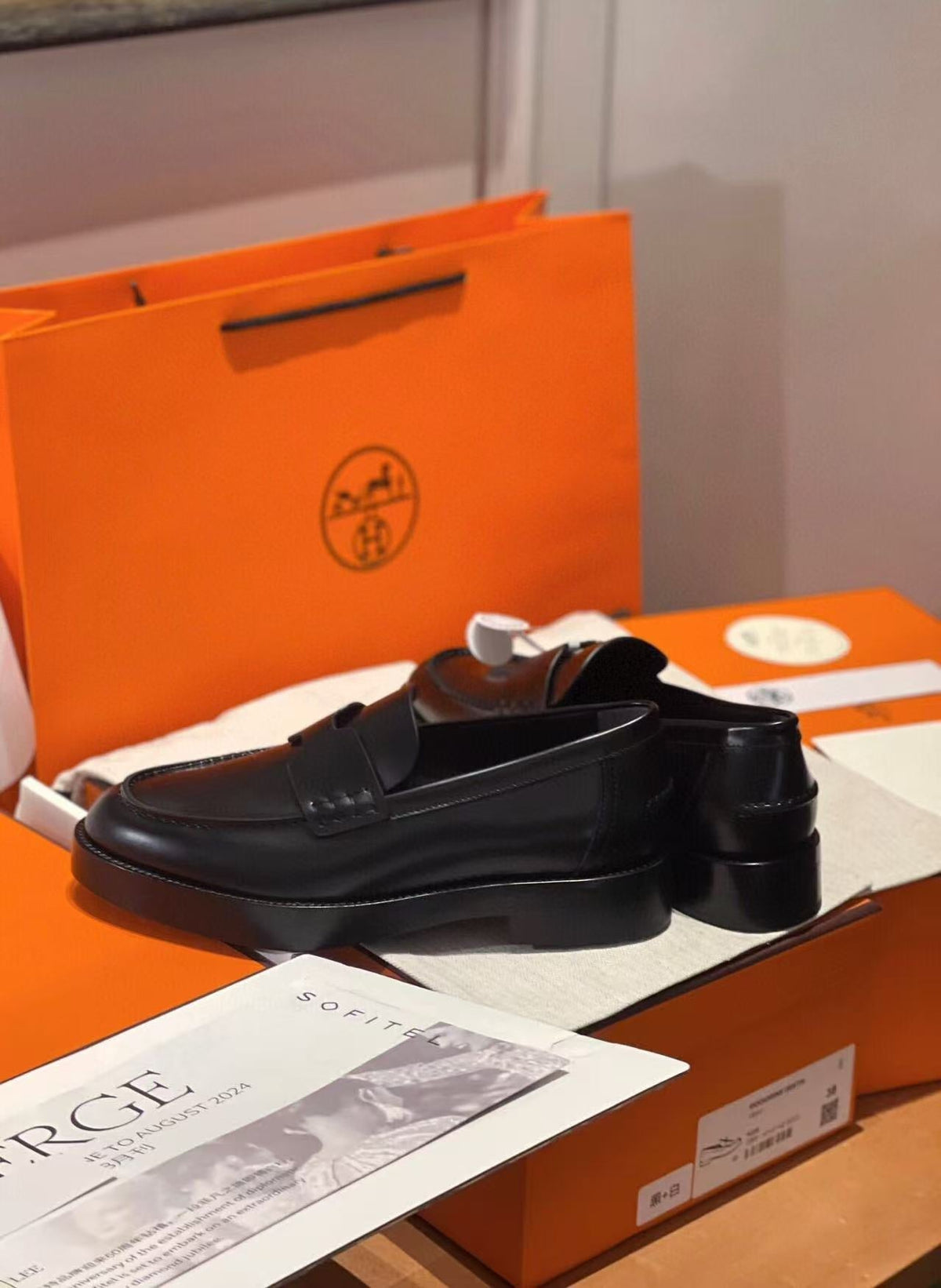 Hermes Paris Loafers in Black Calfskin with Classic Penny Strap Design