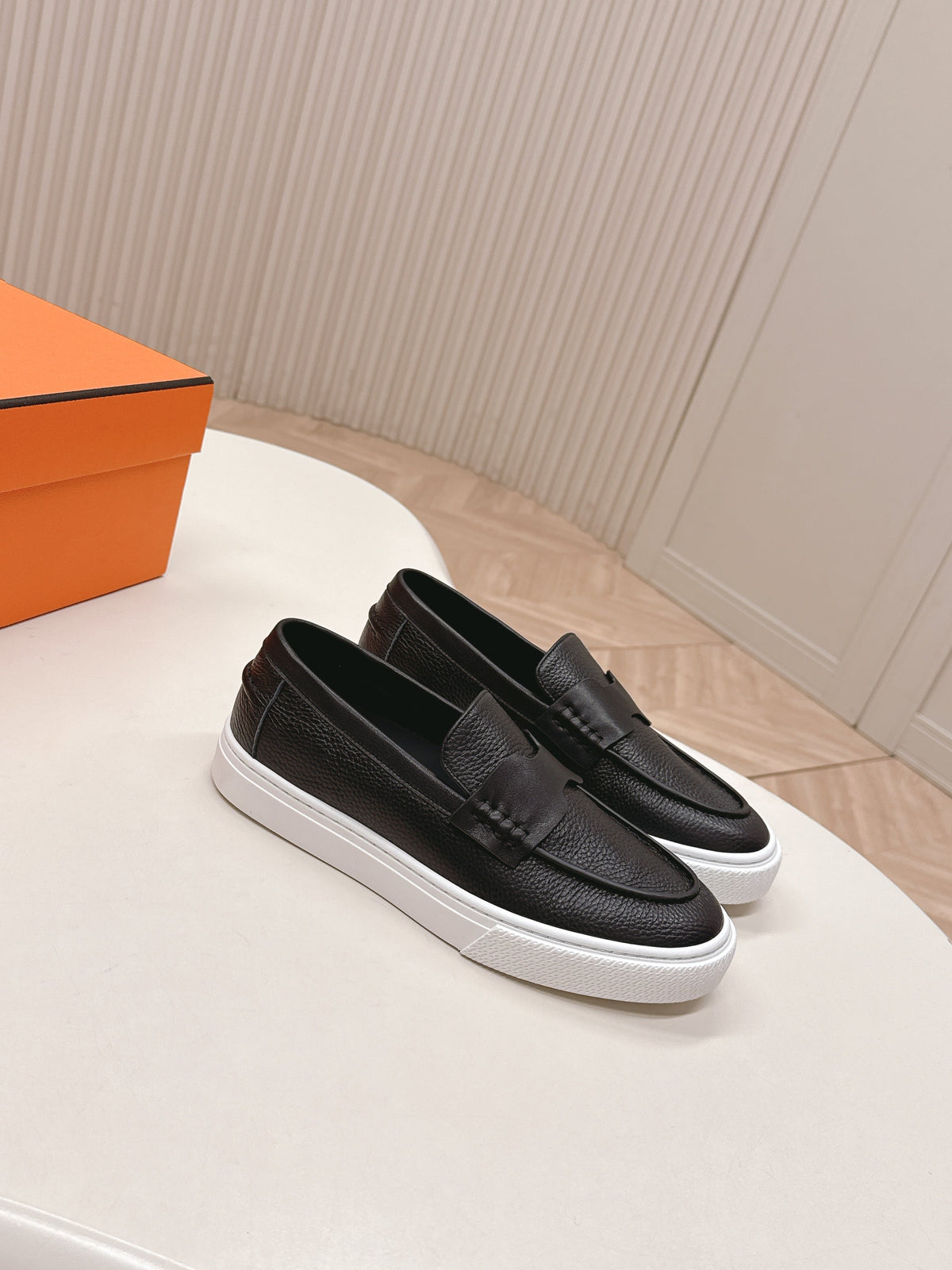 Hermes 25S Slip-On in Black Grained Leather