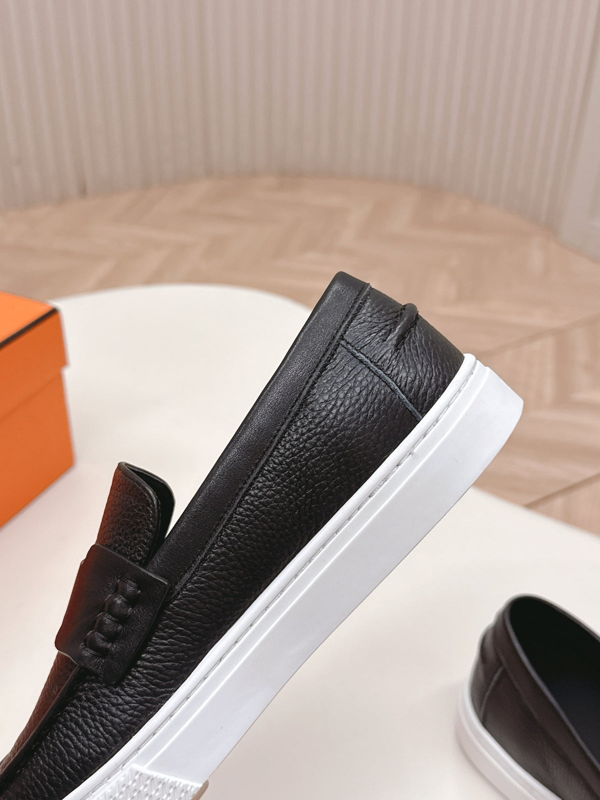Hermes 25S Slip-On in Black Grained Leather