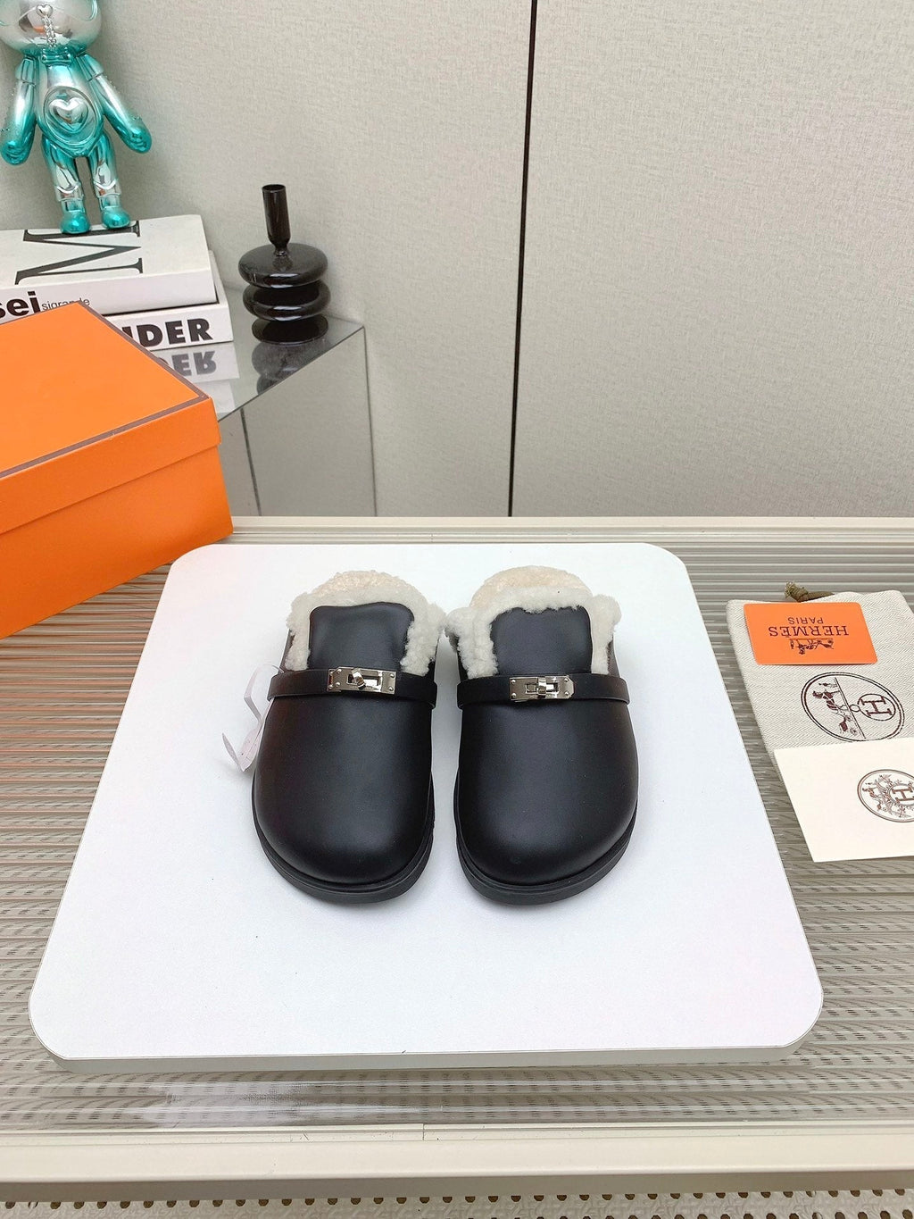 Hermes Slip-On Mule in Black Calfskin and Shearling Lining