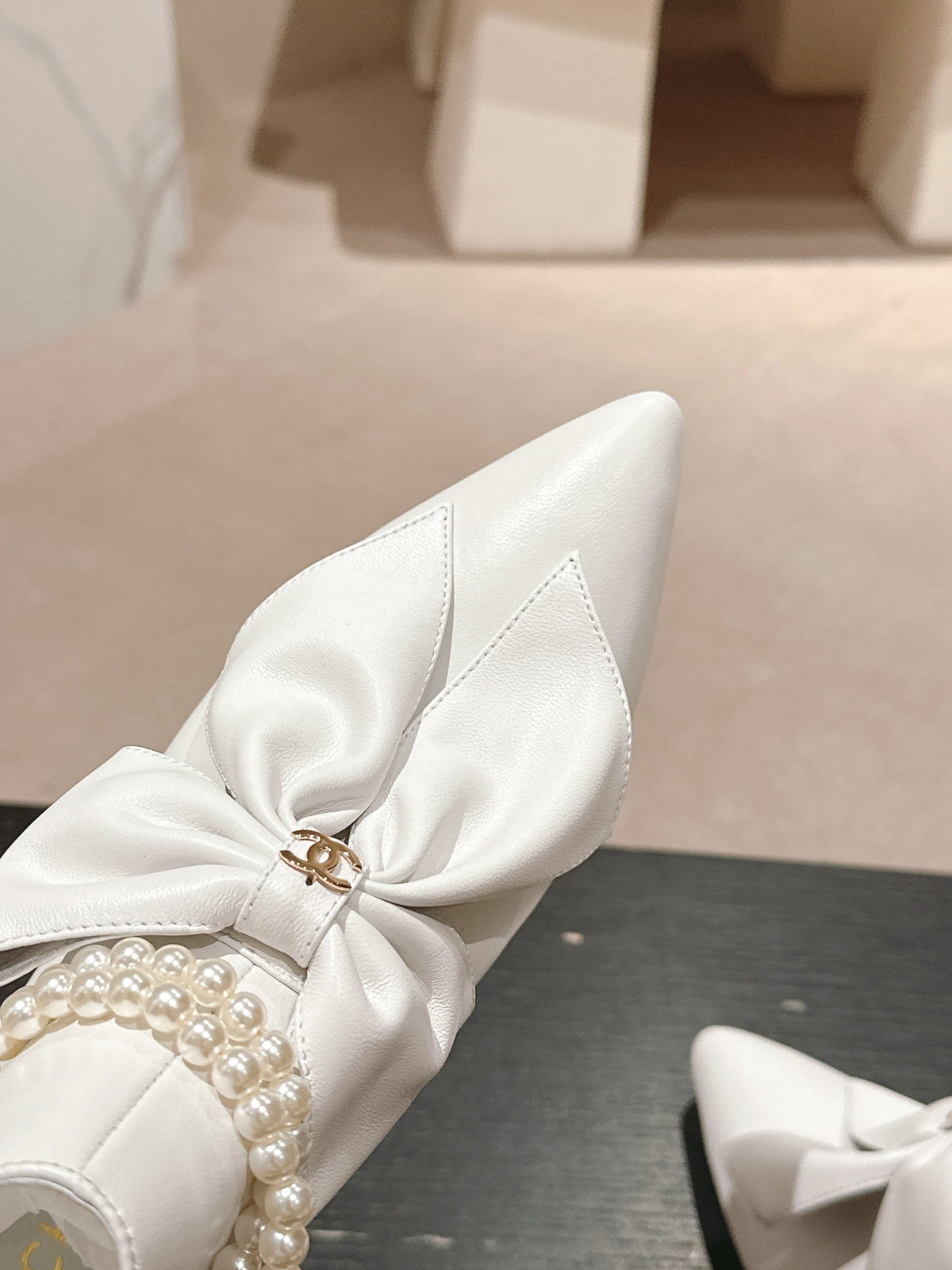 Chanel Short Boots in White Sheepskin with Bow