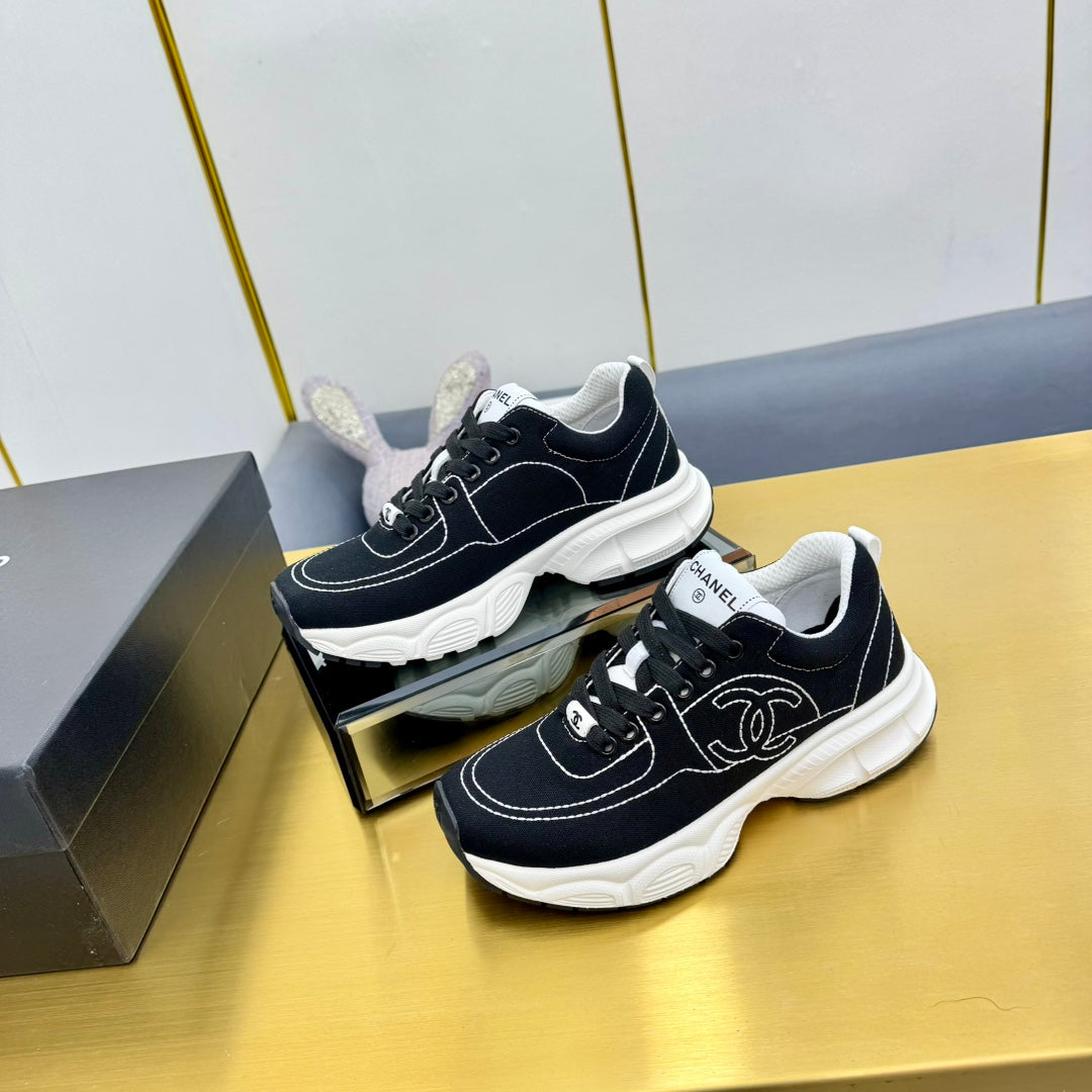 Chanel Sneaker in Black Mix White Breathable Fabric