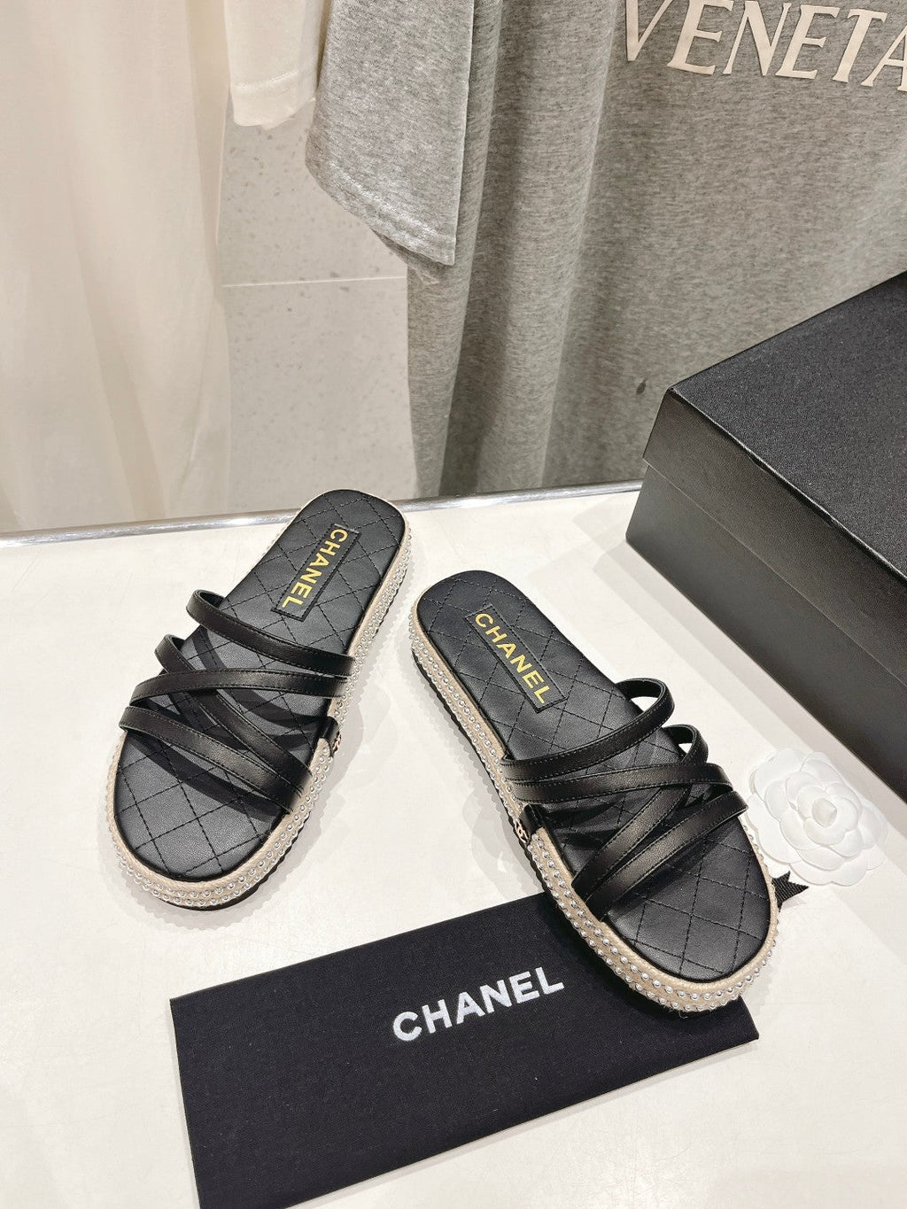 Chanel Slippers Cross Straps in Black Lambskin