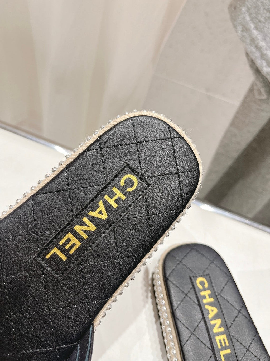 Chanel Slippers Cross Straps in Black Lambskin