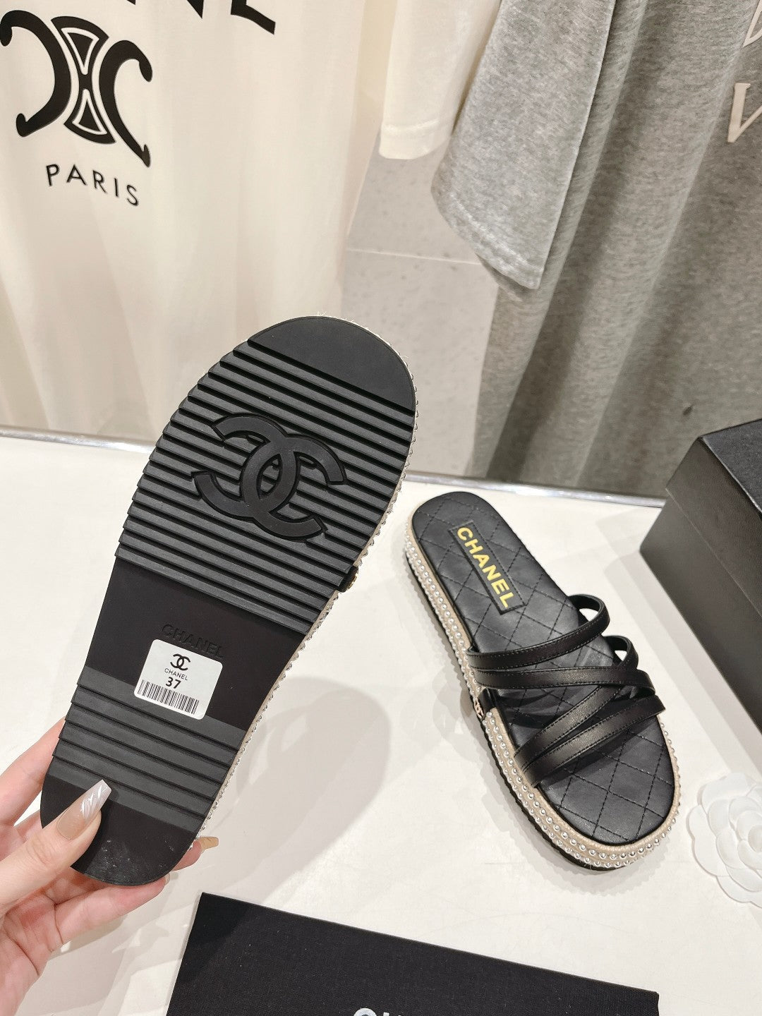 Chanel Slippers Cross Straps in Black Lambskin