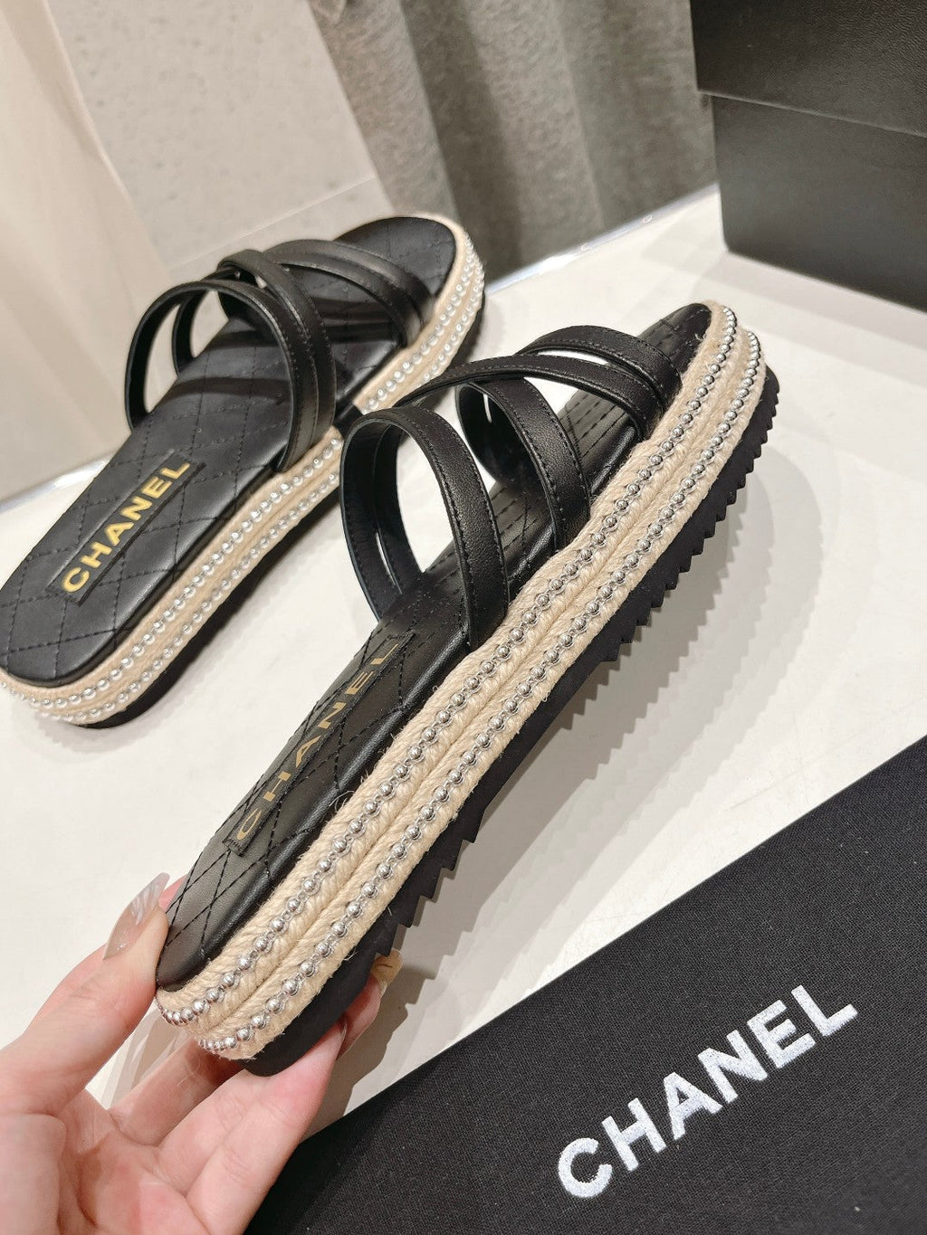 Chanel Slippers Cross Straps in Black Lambskin