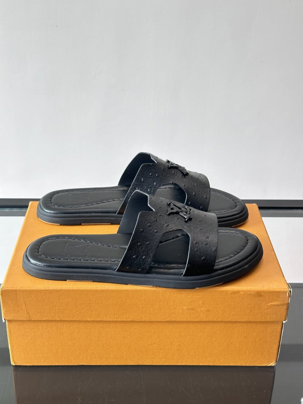 Louis Vuitton Black Embossed Slide Sandals — side