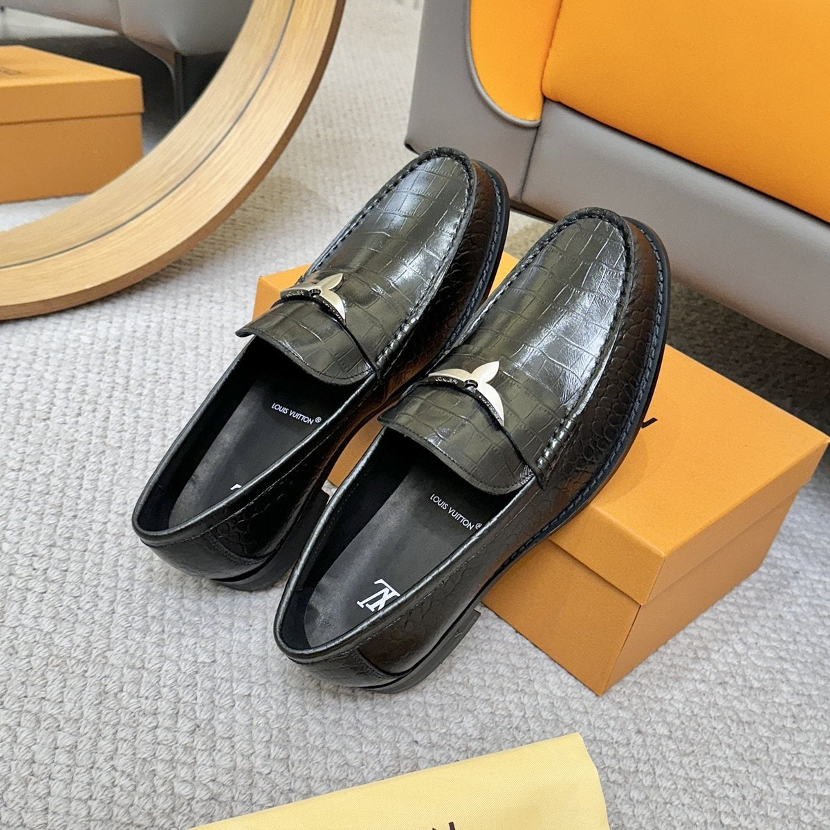 Louis Vuitton Black Embossed Leather Loafers — front