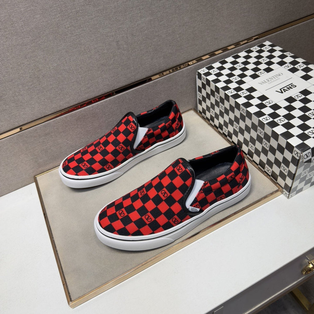 Vans Red and Black Checkerboard Slip-On Sneakers — front