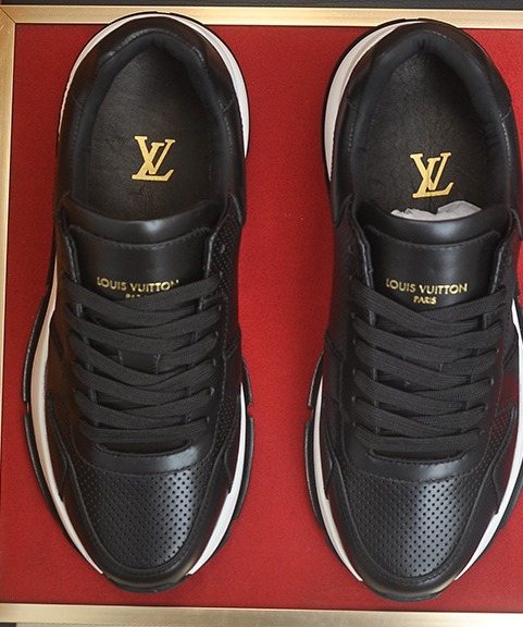 Louis Vuitton Black and White Low-Top Sneakers — hero