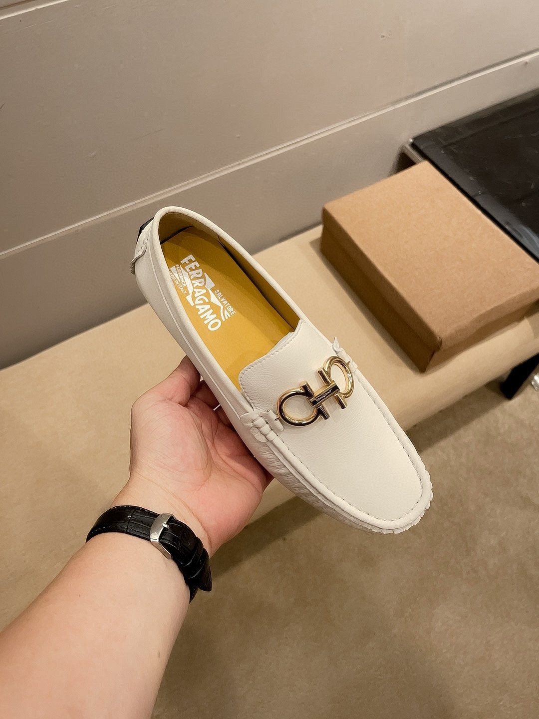 Ferragamo White Hardware Loafers — front