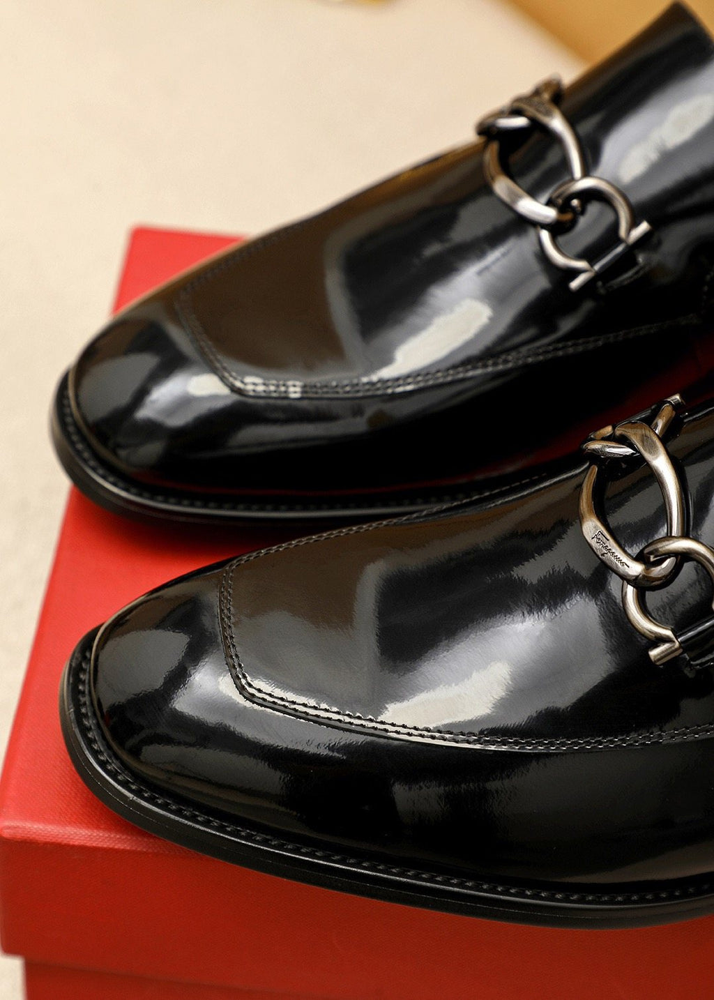 Ferragamo Black Metal-Accent Loafers — detail