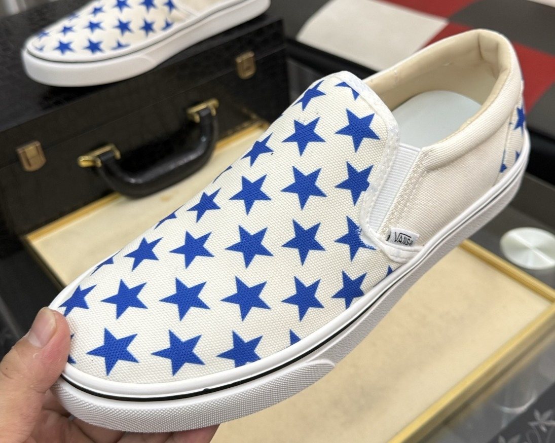 Vans Blue Star Print Slip-On Sneakers — front