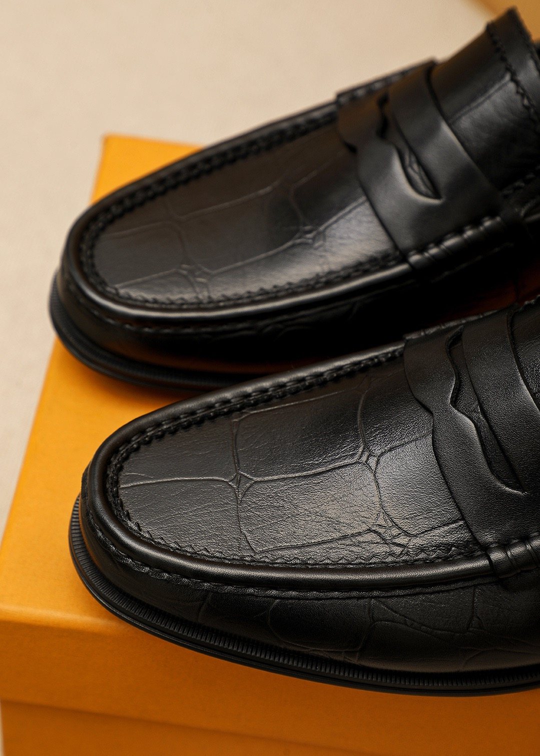 Louis Vuitton Black Textured Slip-On Loafers — detail