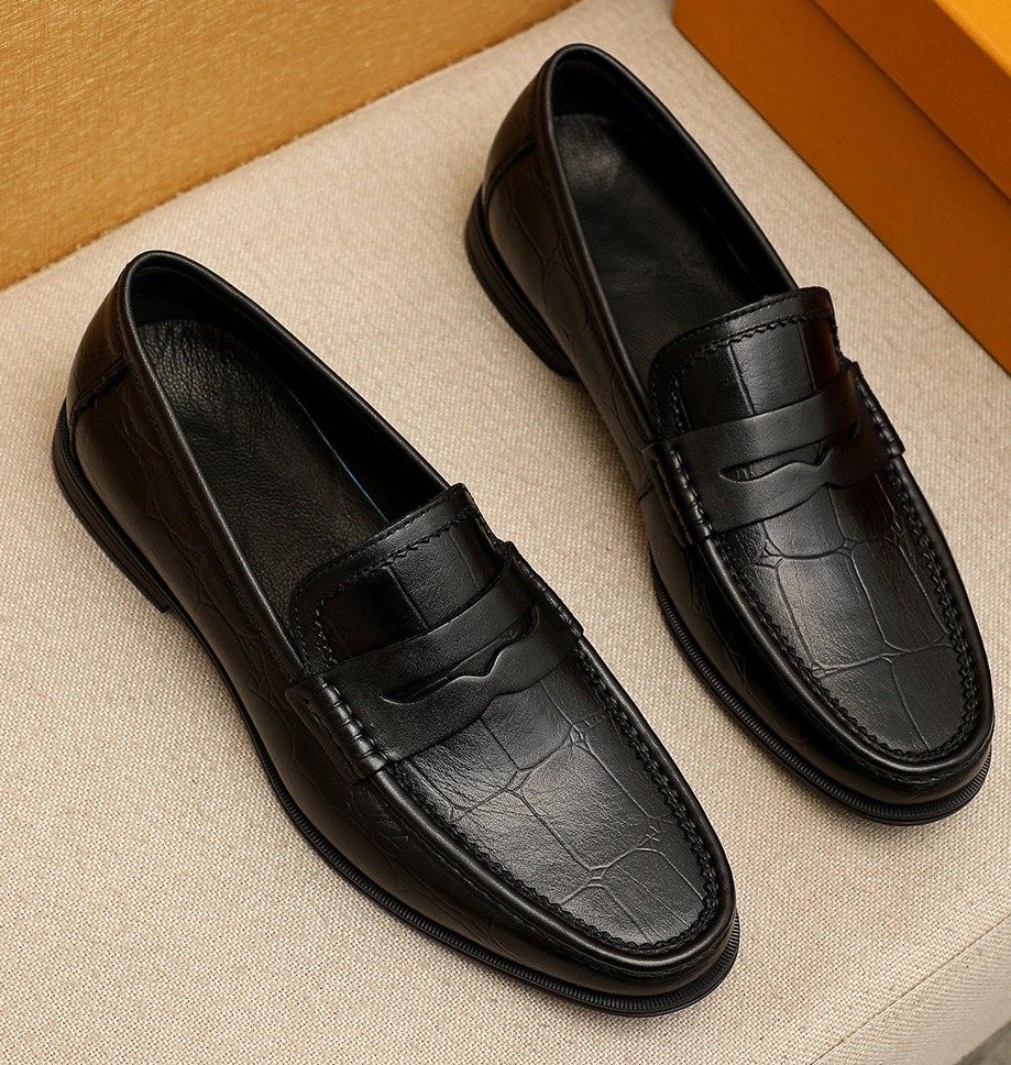 Louis Vuitton Black Textured Slip-On Loafers — hero