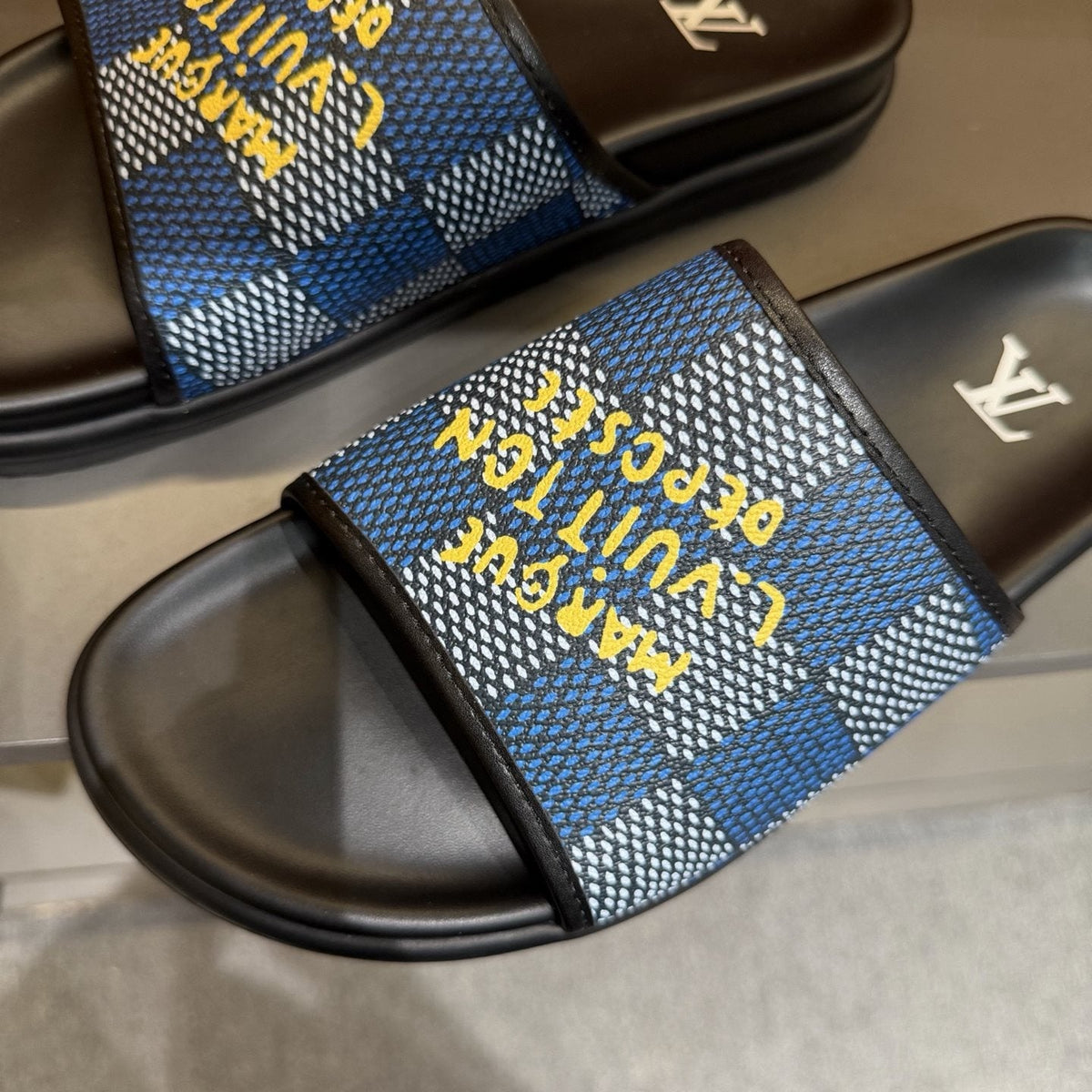 Louis Vuitton Patterned Strap Slides — detail