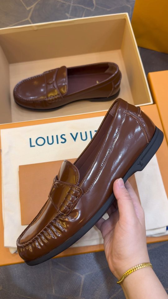 Louis Vuitton Brown Penny Loafers — model