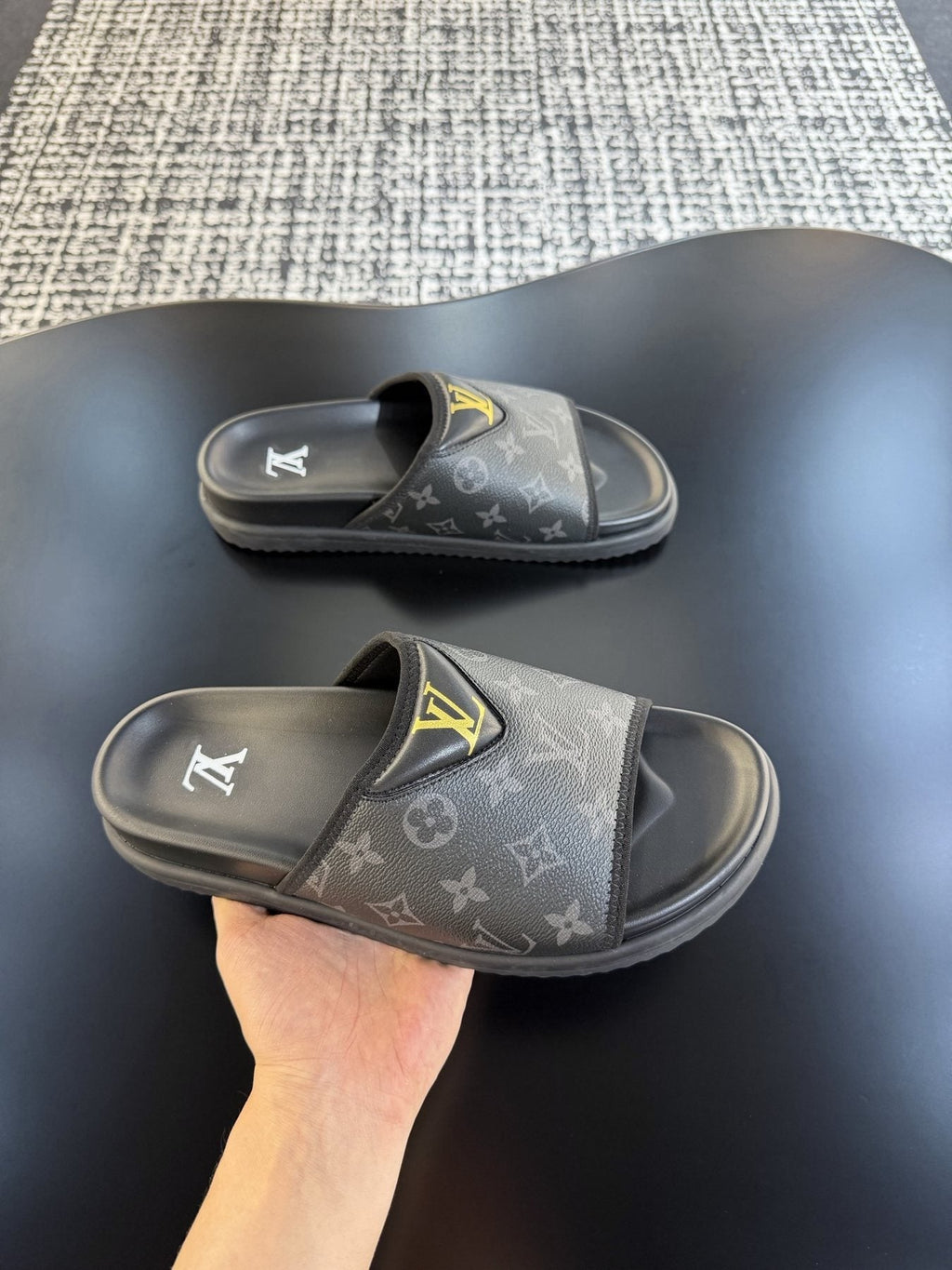 Louis Vuitton Monogram V Slide Sandals — model