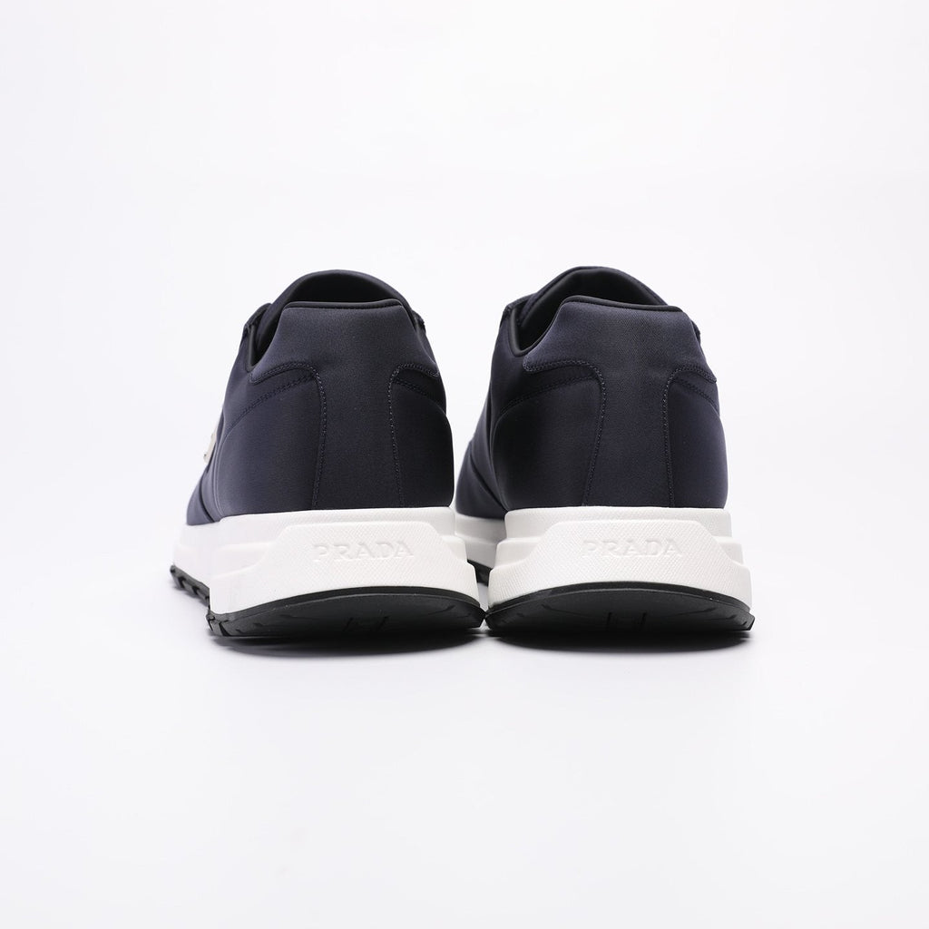 PRADA Navy Triangle Badge Sneakers — back
