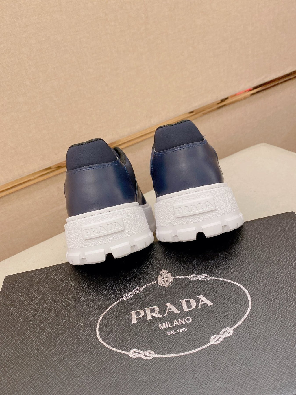 Prada Triangle Plaque Low-Top Sneakers — back