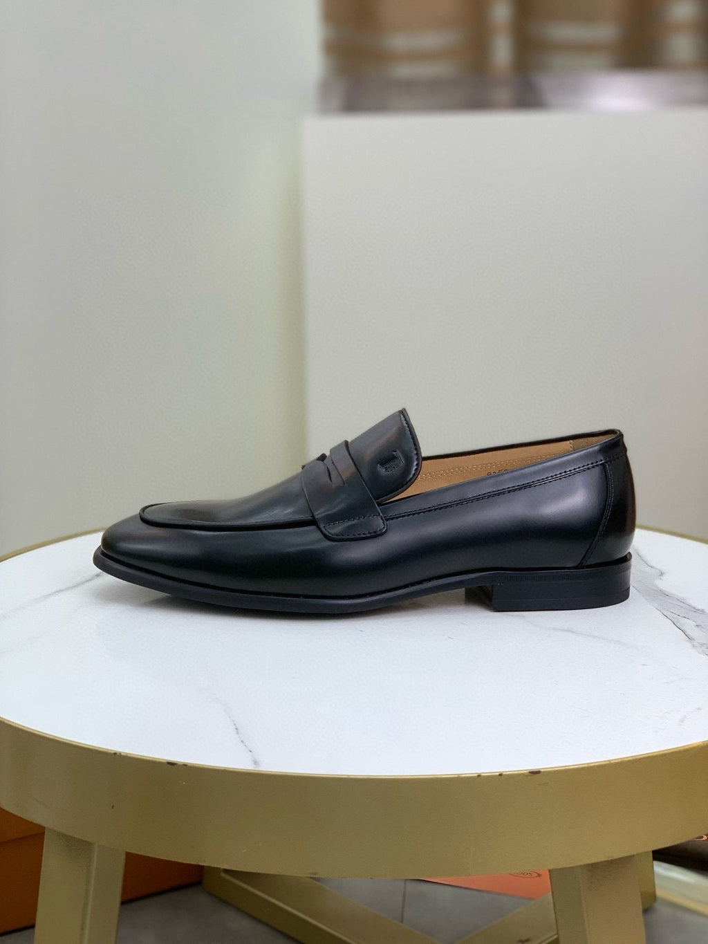 Tod's Black Penny Loafers — side