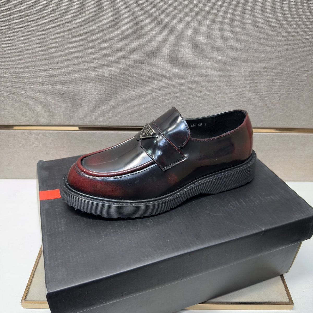 Prada Black Lug Sole Slip-On Shoes — front