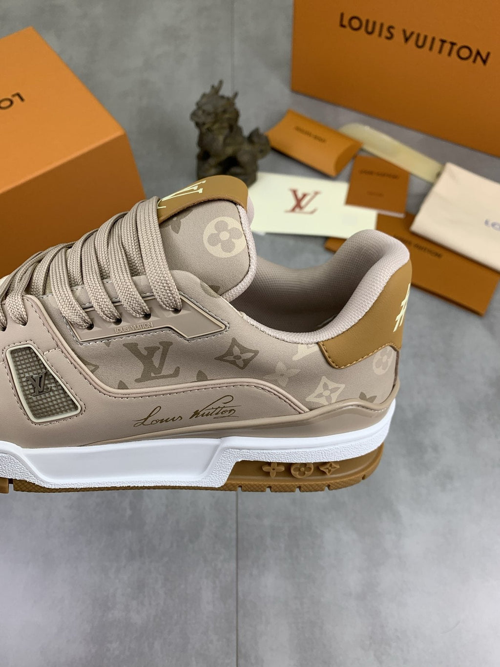Louis Vuitton Beige, White & Gold Low-Top Sneakers — side