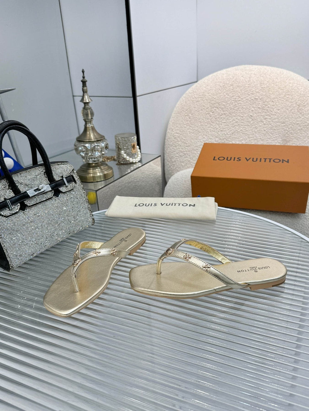 Louis Vuitton Metal-Detail Thong Sandals — front