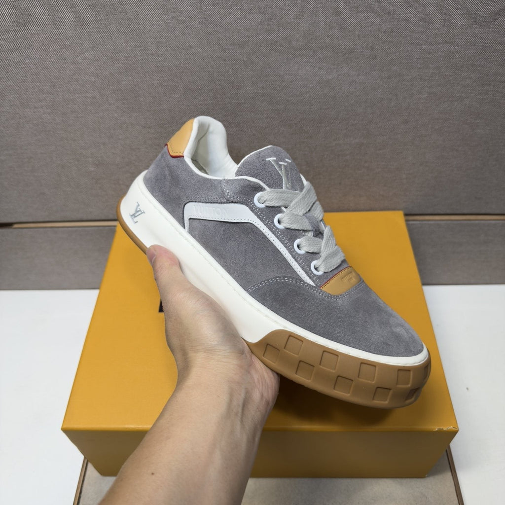 Louis Vuitton Paneled Low-Top Sneakers — model
