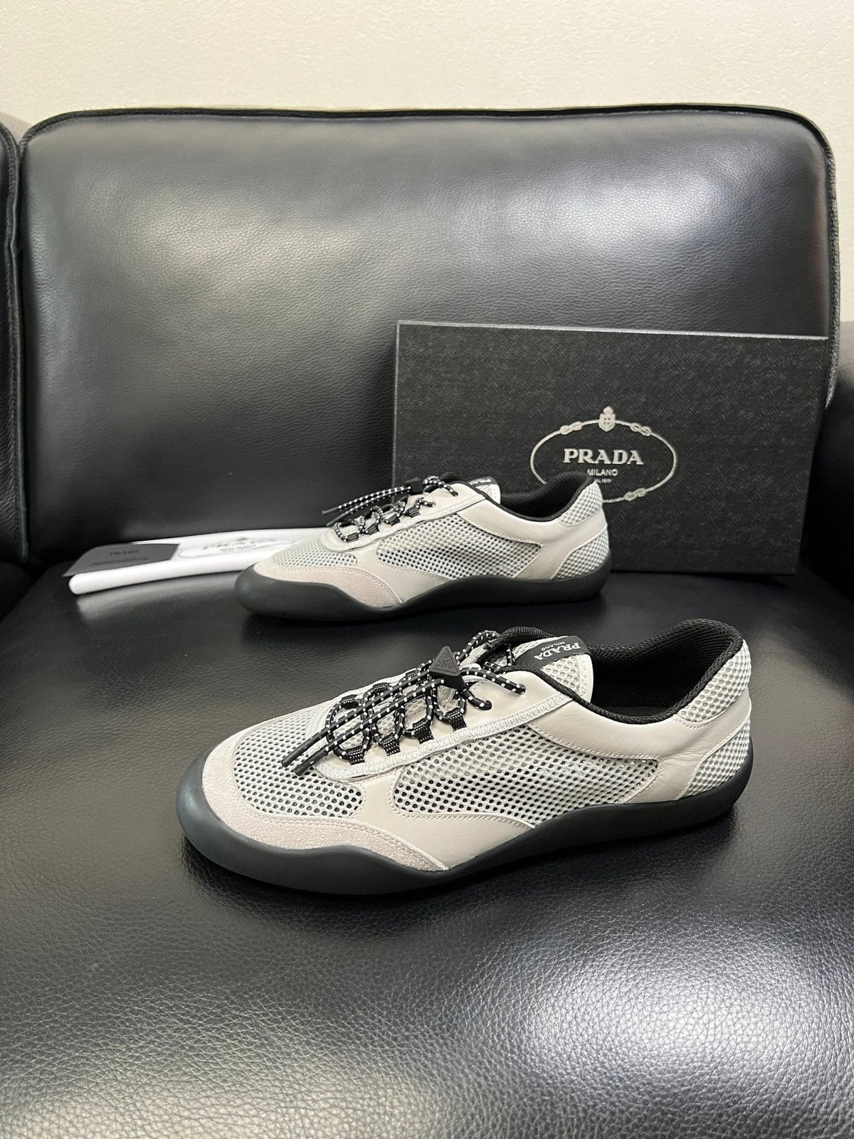 Prada White, Gray & Black Low-Top Sneakers — side