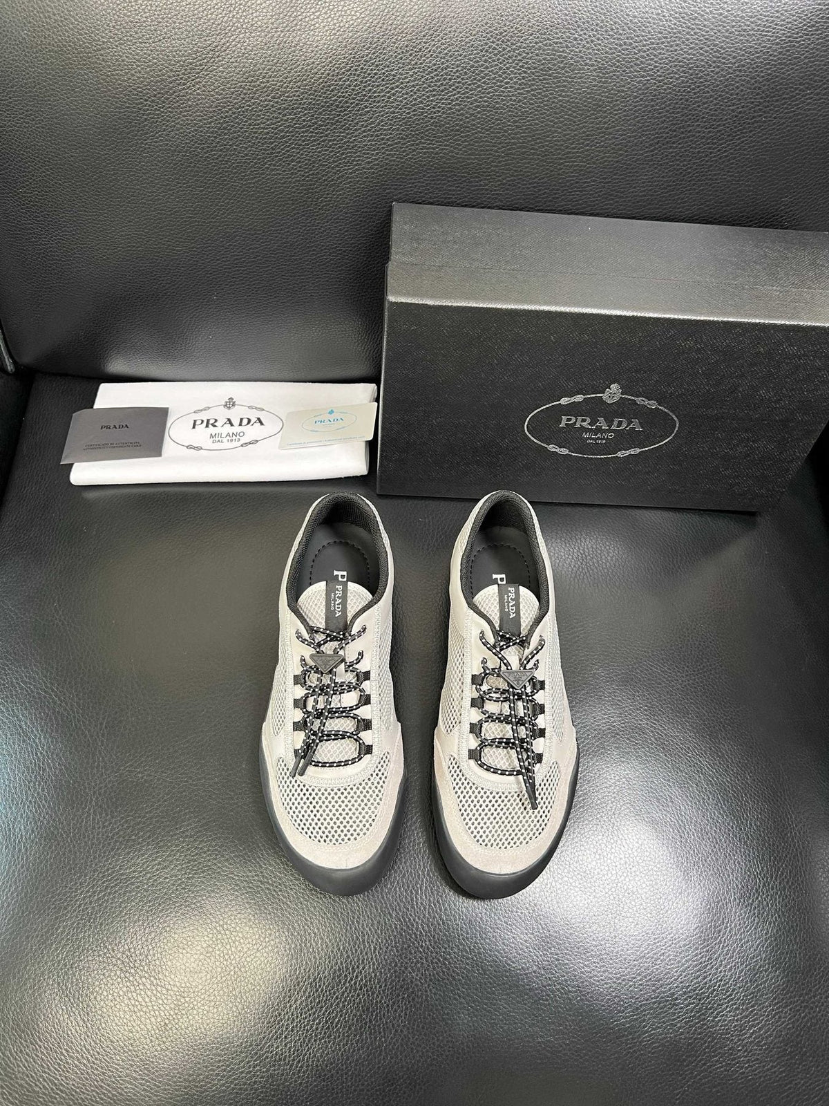 Prada Off-White Perforated Sneakers — front